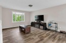 120 Alpine Crescent Se, Airdrie, AB  - Indoor Photo Showing Living Room 