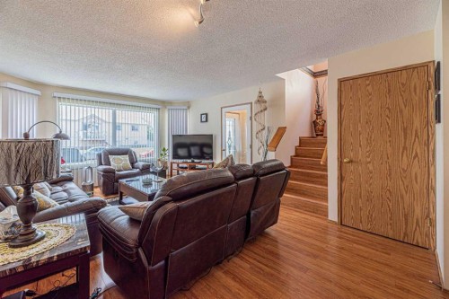 259 Carmel Close Ne, Calgary, AB - Indoor Photo Showing Living Room