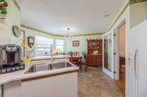 259 Carmel Close Ne, Calgary, AB - Indoor Photo Showing Kitchen With Double Sink
