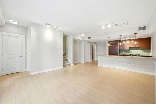 103-733 2 Avenue Sw, Calgary, AB - Indoor Photo Showing Kitchen