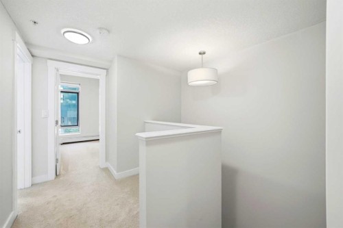 103-733 2 Avenue Sw, Calgary, AB - Indoor Photo Showing Other Room