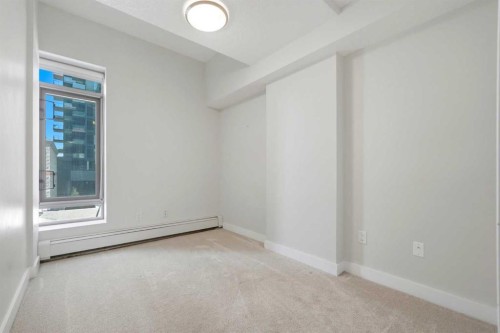 103-733 2 Avenue Sw, Calgary, AB - Indoor Photo Showing Other Room