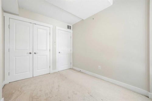 103-733 2 Avenue Sw, Calgary, AB - Indoor Photo Showing Other Room