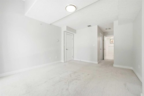 103-733 2 Avenue Sw, Calgary, AB - Indoor Photo Showing Other Room