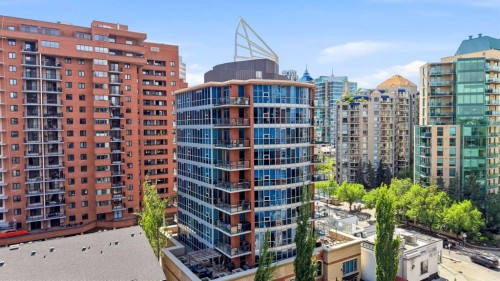 103-733 2 Avenue Sw, Calgary, AB - Outdoor With Balcony With Facade