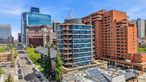 103-733 2 Avenue Sw, Calgary, AB - Outdoor With Balcony With Facade