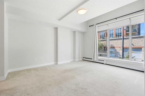 103-733 2 Avenue Sw, Calgary, AB - Indoor Photo Showing Other Room