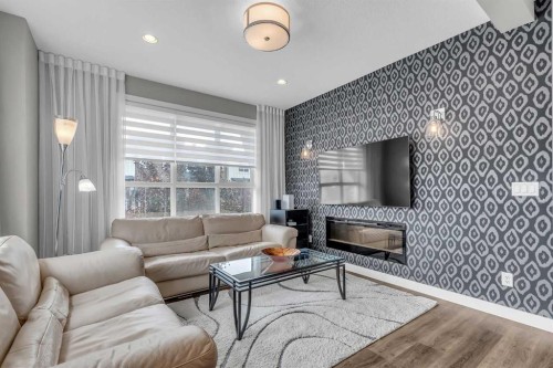 101 Walgrove Cove Se, Calgary, AB - Indoor Photo Showing Living Room With Fireplace