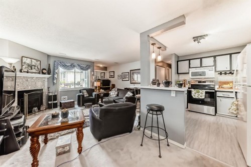 51 Cedar Springs Gardens Sw, Calgary, AB - Indoor With Fireplace