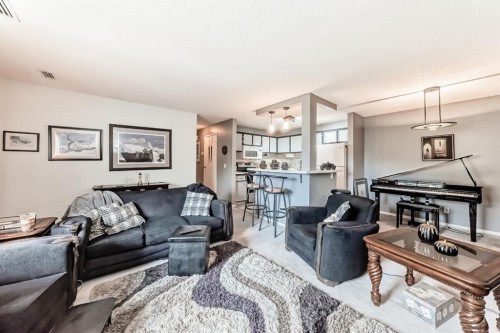 51 Cedar Springs Gardens Sw, Calgary, AB - Indoor Photo Showing Living Room