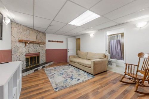 6795 Malvern Road Ne, Calgary, AB - Indoor With Fireplace
