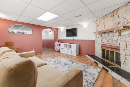 6795 Malvern Road Ne, Calgary, AB - Indoor With Fireplace