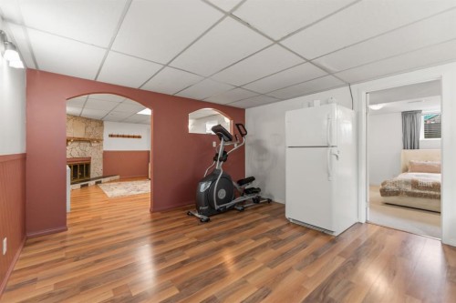 6795 Malvern Road Ne, Calgary, AB - Indoor Photo Showing Gym Room