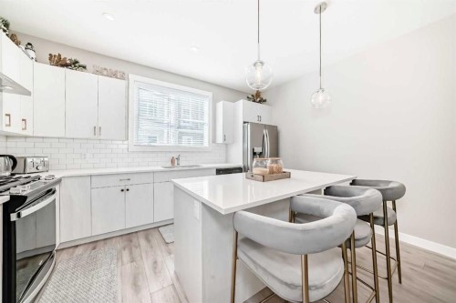 410 Cranbrook Walk Se, Calgary, AB - Indoor Photo Showing Kitchen With Upgraded Kitchen