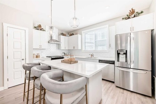 410 Cranbrook Walk Se, Calgary, AB - Indoor Photo Showing Kitchen With Stainless Steel Kitchen With Upgraded Kitchen