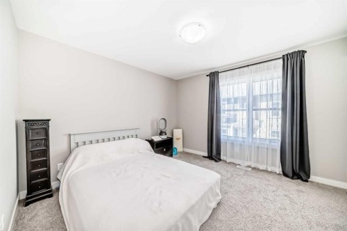 410 Cranbrook Walk Se, Calgary, AB - Indoor Photo Showing Bedroom