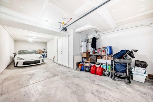 410 Cranbrook Walk Se, Calgary, AB - Indoor Photo Showing Garage