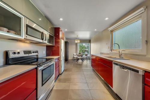 7 Deerwood Road Se, Calgary, AB - Indoor Photo Showing Kitchen With Upgraded Kitchen