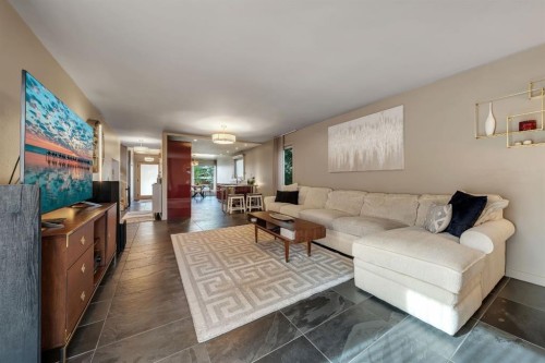 7 Deerwood Road Se, Calgary, AB - Indoor Photo Showing Living Room