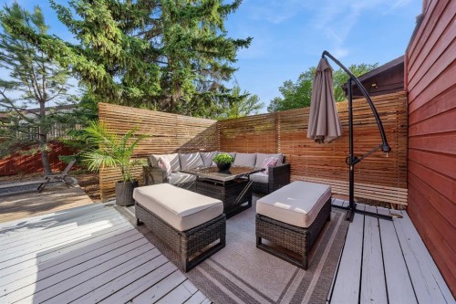 7 Deerwood Road Se, Calgary, AB - Outdoor With Deck Patio Veranda With Exterior