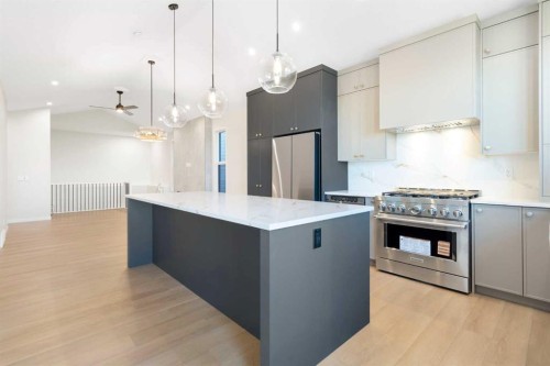 147 Marmot Grove Nw, Calgary, AB - Indoor Photo Showing Kitchen With Upgraded Kitchen