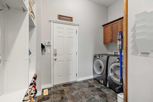 194 Brightonstone Bay Se, Calgary, AB - Indoor Photo Showing Laundry Room