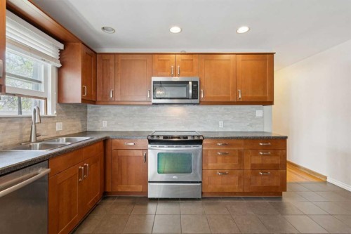 1115 Radnor Avenue Ne, Calgary, AB - Indoor Photo Showing Kitchen With Double Sink
