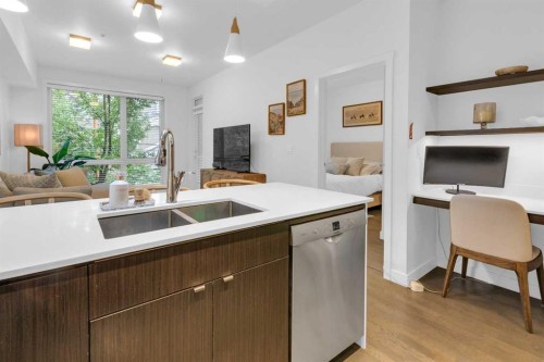 228-305 18 Avenue Sw, Calgary, AB - Indoor Photo Showing Kitchen With Double Sink