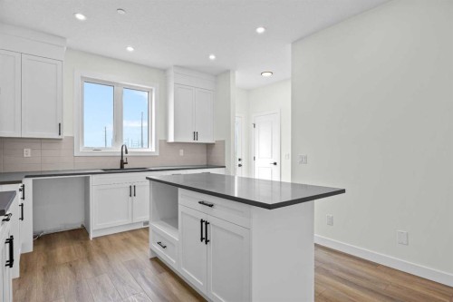 41 Hotchkiss Gardens Se, Calgary, AB - Indoor Photo Showing Kitchen With Upgraded Kitchen
