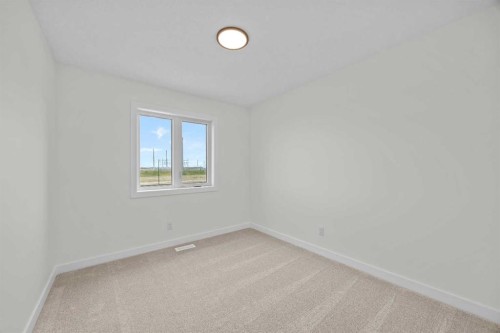 41 Hotchkiss Gardens Se, Calgary, AB - Indoor Photo Showing Other Room