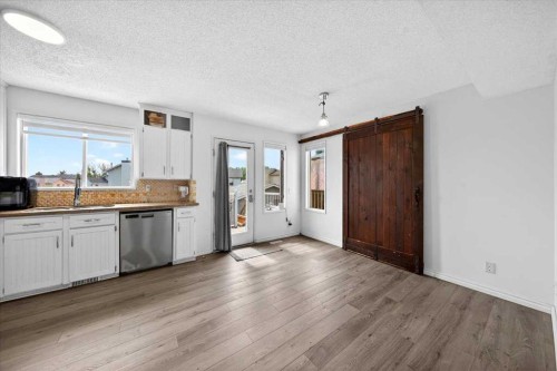 6979 Laguna Way Ne, Calgary, AB - Indoor Photo Showing Kitchen