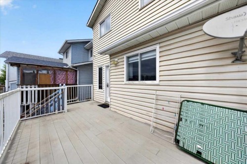 6979 Laguna Way Ne, Calgary, AB - Outdoor With Deck Patio Veranda With Exterior