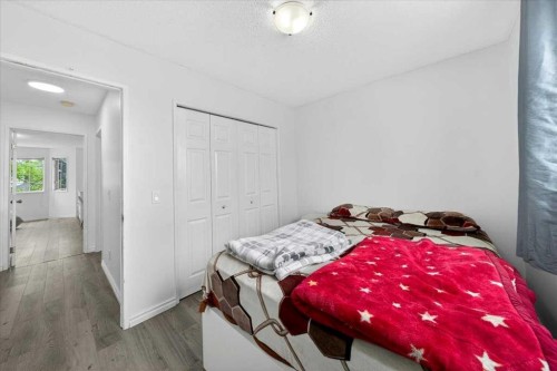 6979 Laguna Way Ne, Calgary, AB - Indoor Photo Showing Bedroom