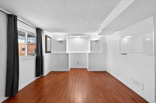 6979 Laguna Way Ne, Calgary, AB - Indoor Photo Showing Other Room