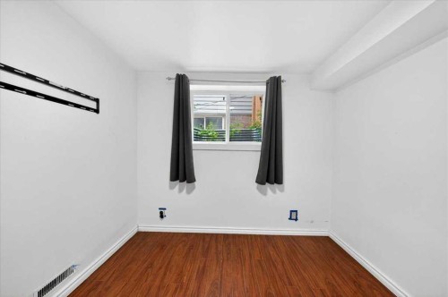 6979 Laguna Way Ne, Calgary, AB - Indoor Photo Showing Other Room