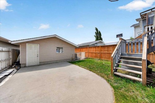 6979 Laguna Way Ne, Calgary, AB - Outdoor With Exterior