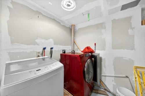 6979 Laguna Way Ne, Calgary, AB - Indoor Photo Showing Laundry Room