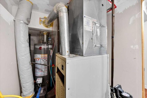 6979 Laguna Way Ne, Calgary, AB - Indoor Photo Showing Basement