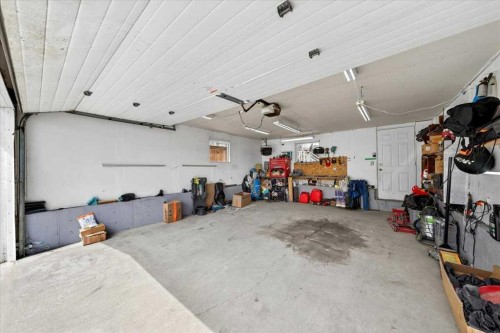 6979 Laguna Way Ne, Calgary, AB - Indoor Photo Showing Garage