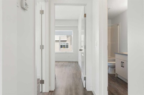 401-24 Rivercrest Drive, Cochrane, AB - Indoor Photo Showing Other Room