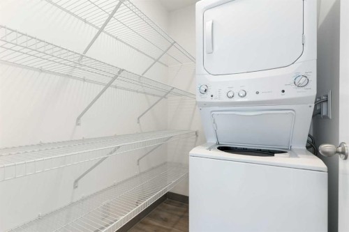 401-24 Rivercrest Drive, Cochrane, AB - Indoor Photo Showing Laundry Room