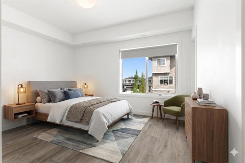 401-24 Rivercrest Drive, Cochrane, AB - Indoor Photo Showing Bedroom