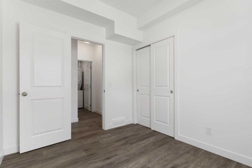 401-24 Rivercrest Drive, Cochrane, AB - Indoor Photo Showing Other Room