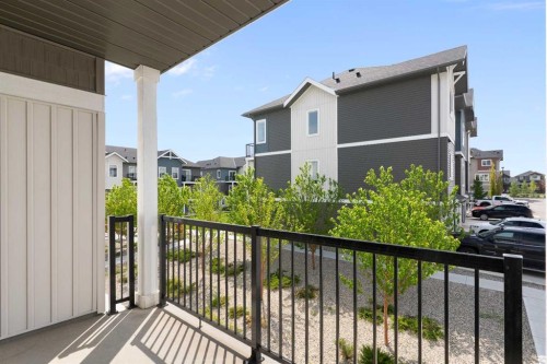 401-24 Rivercrest Drive, Cochrane, AB - Outdoor With Exterior