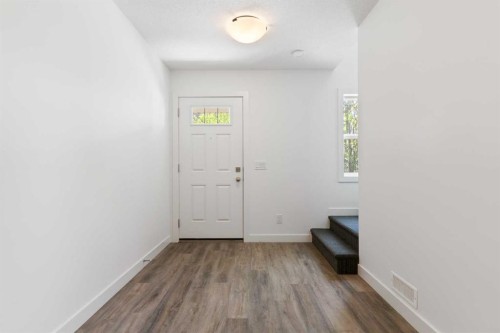 401-24 Rivercrest Drive, Cochrane, AB - Indoor Photo Showing Other Room