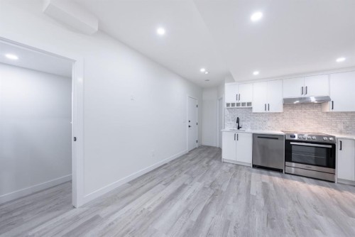 260 Belmont Boulevard Sw, Calgary, AB - Indoor Photo Showing Kitchen With Stainless Steel Kitchen With Upgraded Kitchen