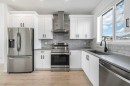 260 Belmont Boulevard Sw, Calgary, AB  - Indoor Photo Showing Kitchen With Stainless Steel Kitchen With Double Sink With Upgraded Kitchen 