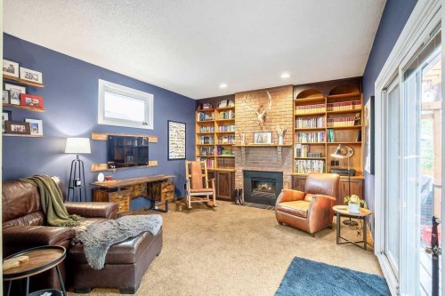 723 5 Avenue Sw, High River, AB - Indoor With Fireplace