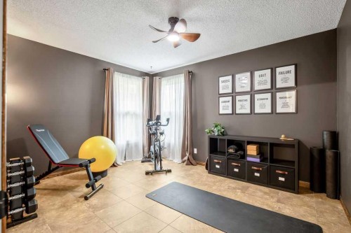 723 5 Avenue Sw, High River, AB - Indoor Photo Showing Gym Room