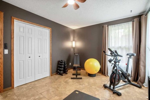 723 5 Avenue Sw, High River, AB - Indoor Photo Showing Gym Room